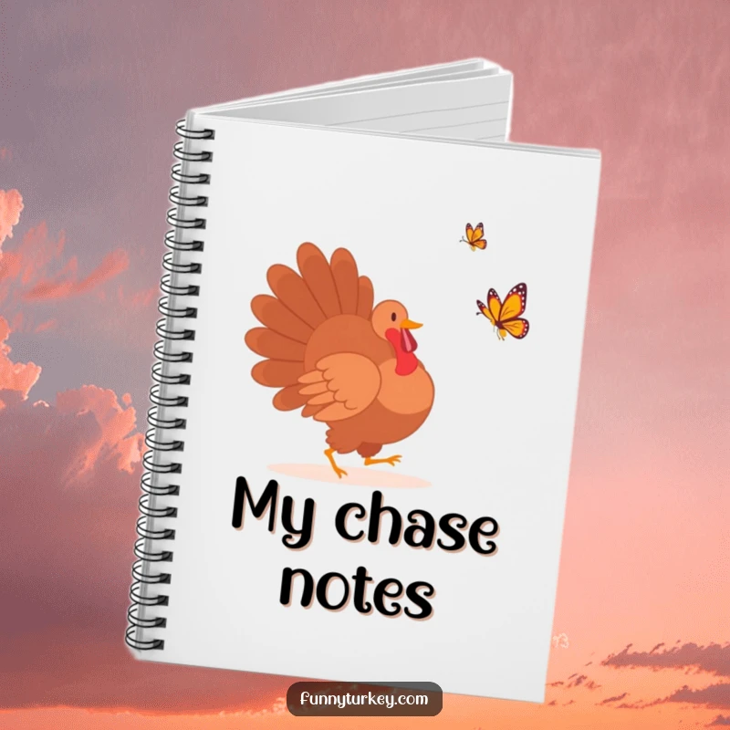 Lined notebook with a funny turkey silhouette chasing a colorful butterfly on the cover, perfect for capturing ideas humorously.
